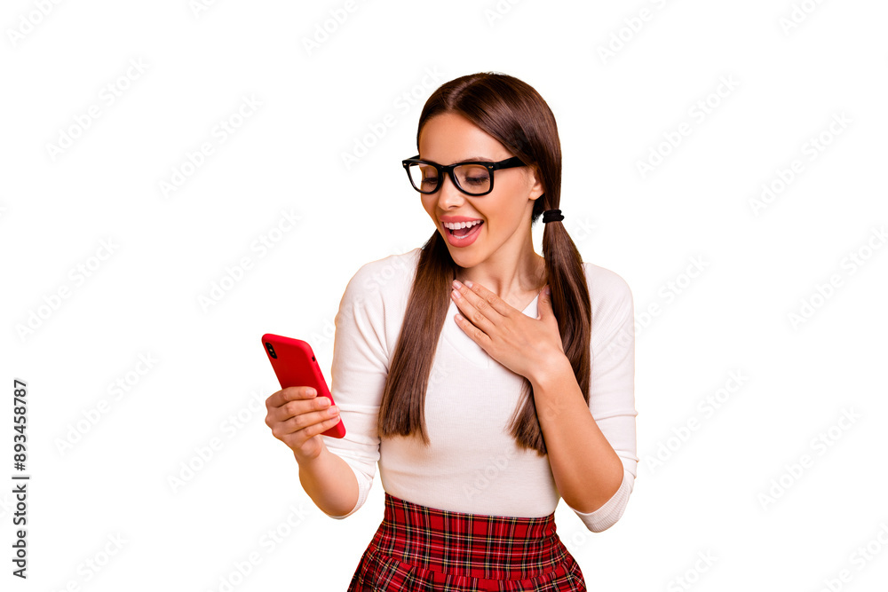 Portrait of nice attractive lovely cheerful flirty girl wearing eyeglasses eyewear holding in hand cell reading blog post smm sms from boyfriend isolated on bright vivid shine yellow background Portrait of nice attractive lovely cheerful flirty girl wearing eyeglasses eyewear holding in hand cell reading blog post smm sms from boyfriend isolated on bright vivid shine yellow background