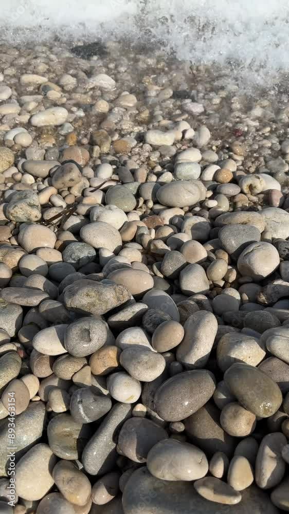 A pile of rocks with a variety of sizes and colors A pile of rocks with a variety of sizes and colors