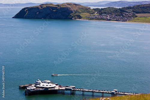 A view of Llandudno, featuring the Grade I Listed pleasure pier, bay & Little Orme, Crueddyn Peninsula, North Wales photo