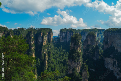Zhangjiajie national forest park, China, Glass bridge of Zhangjiajie China Tianzishan with blue sky, concept of world heritage, avatar, heritage peak or cliff mountain, tourist attraction famous place