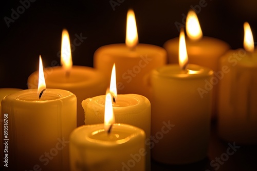 a group of candles lit up