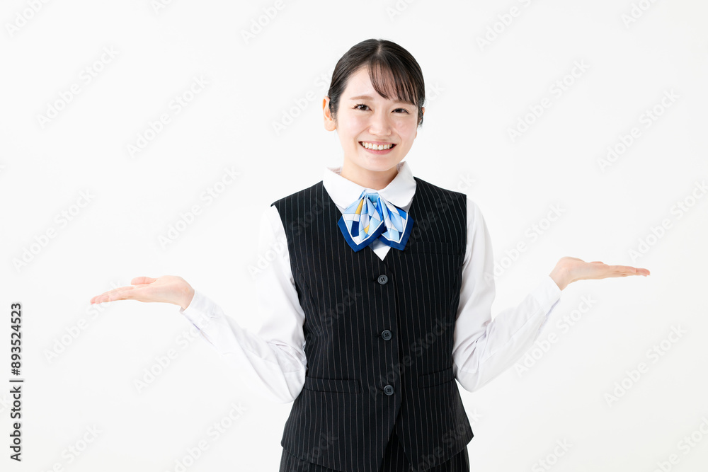 手かざしをする制服姿の女性 手かざしをする制服姿の女性