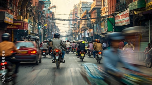 A city street with colorful rickshaws and scooters weaving through traffic. photo