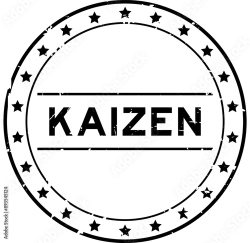 Grunge black kaizen word round rubber seal stamp on white background