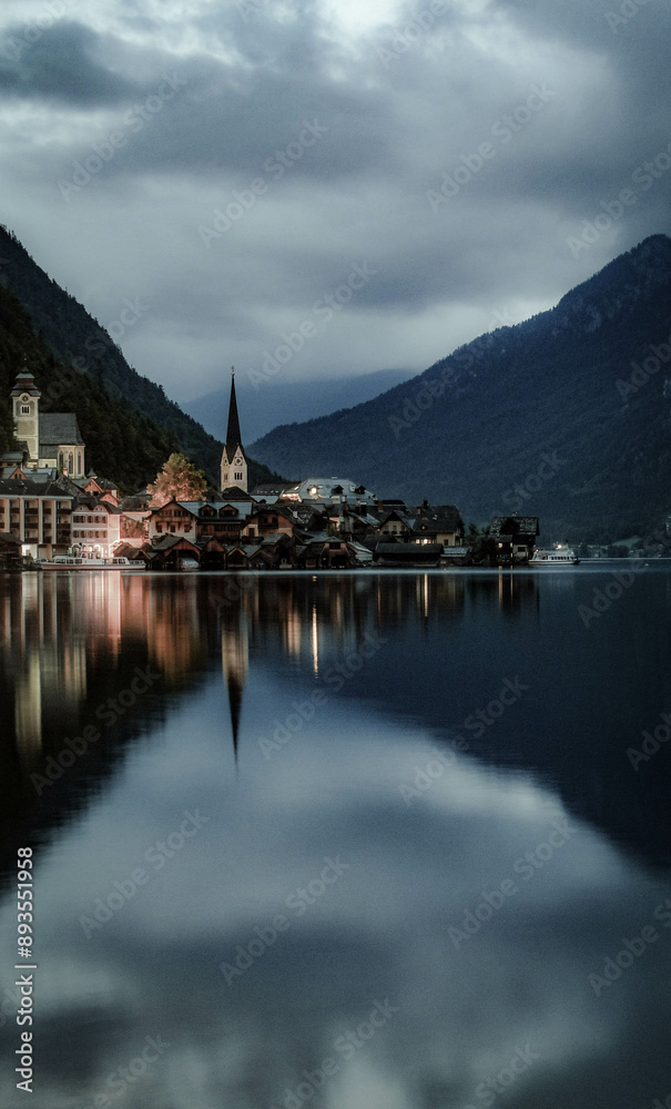Fototapeta premium Sunrise with reflections on lake Hallsttat, Austria