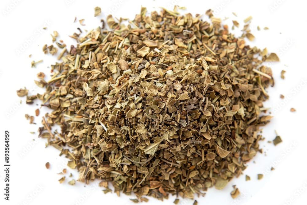 An isolated top view of dry, chopped marjoram leaves An isolated top view of dry, chopped marjoram leaves