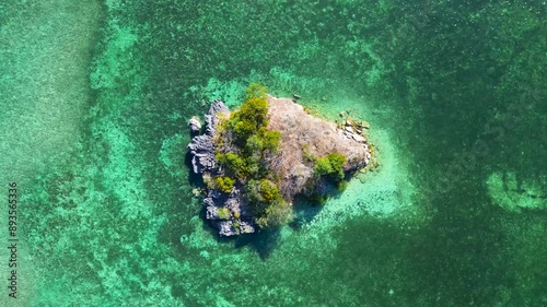 Aerial view of a tiny island outside Rangko Cave in Tanjung Boleng, Boleng, West Manggarai Regency, Flores, East Nusa Tenggara, Indonesia