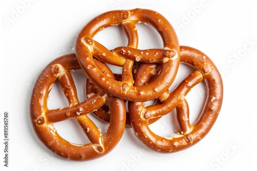 Salty cracker pretzel sticks, stuffed with peanuts, on white
