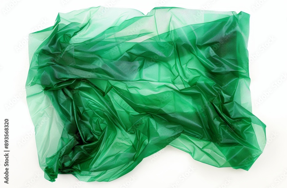 A ragged and crumpled piece of green nylon is flying, isolated on a white background, and is clipping A ragged and crumpled piece of green nylon is flying, isolated on a white background, and is clipping