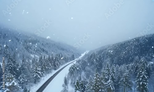 Snowfall is especially heavy on winter roads photo