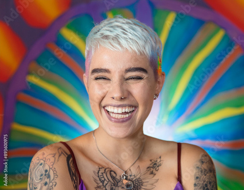 Psychedelic Studio Portrait of a Giggling Tattooed Woman with Copy Space