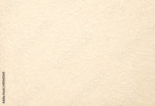 Light beige paper wrinkled and speckled. Texture for composition. Background, copy space.