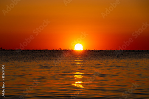 Beautiful sunrise over the morning sea.