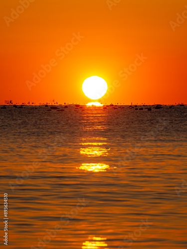 Beautiful sunrise over the morning sea.