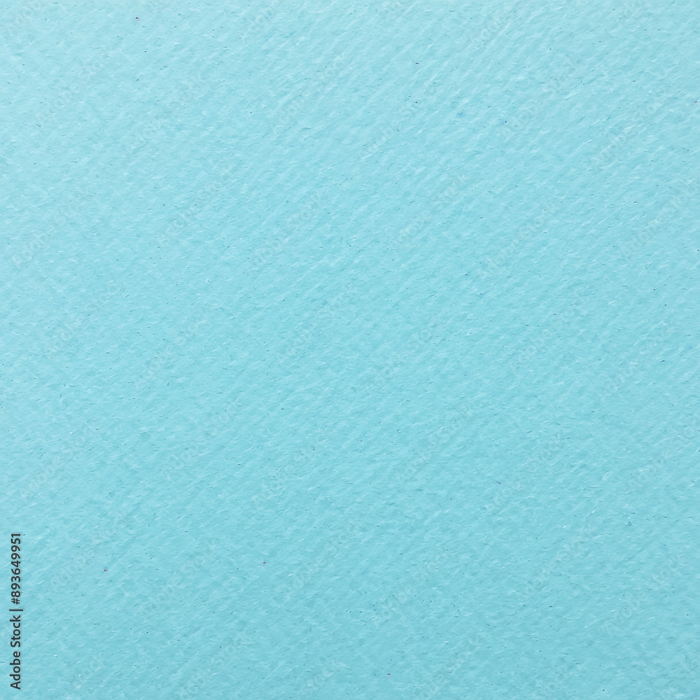 Fototapeta premium Light blue paper wrinkled and speckled. Texture for composition. Background, copy space.