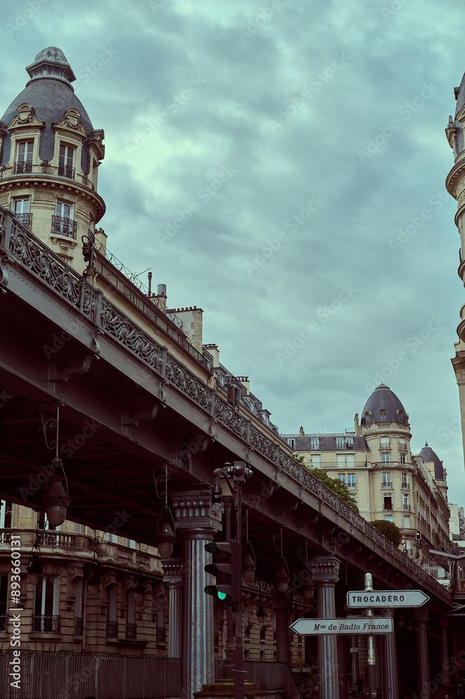 Fototapeta premium Sightseeing in Paris through Montmartre, the Latin Quarter, Notre Dame, the Eiffel Tower, the Champs Elysées, the Louvre Museum and the streets with ancient buildings, in the year of the Olympic Games