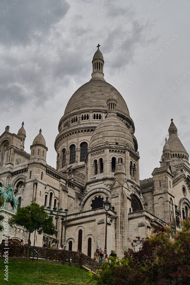 Sightseeing in Paris through Montmartre, the Latin Quarter, Notre Dame, the Eiffel Tower, the Champs Elysées, the Louvre Museum and the streets with ancient buildings, in the year of the Olympic Games Sightseeing in Paris through Montmartre, the Latin Quarter, Notre Dame, the Eiffel Tower, the Champs Elysées, the Louvre Museum and the streets with ancient buildings, in the year of the Olympic Games