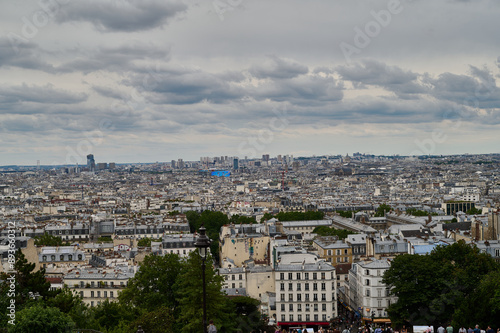 Sightseeing in Paris through Montmartre, the Latin Quarter, Notre Dame, the Eiffel Tower, the Champs Elysées, the Louvre Museum and the streets with ancient buildings, in the year of the Olympic Games