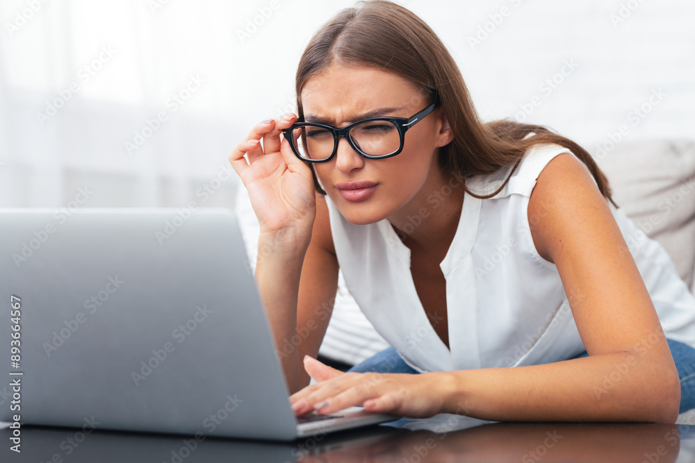 Poor Eyesight. Girl Looking At Laptop Having Near Vision Problem At Home. Selective Focus Poor Eyesight. Girl Looking At Laptop Having Near Vision Problem At Home. Selective Focus