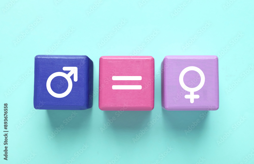 Cube with equals sign between female and male gender symbols on turquoise background Cube with equals sign between female and male gender symbols on turquoise background