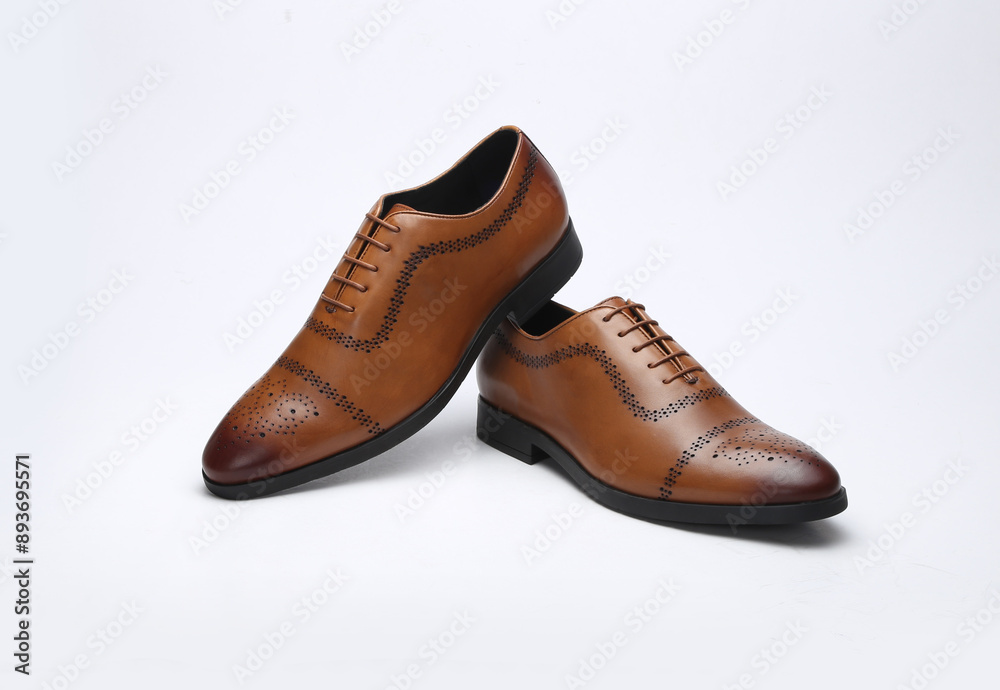 tan leather oxford brogue shoes isolated on white background tan leather oxford brogue shoes isolated on white background