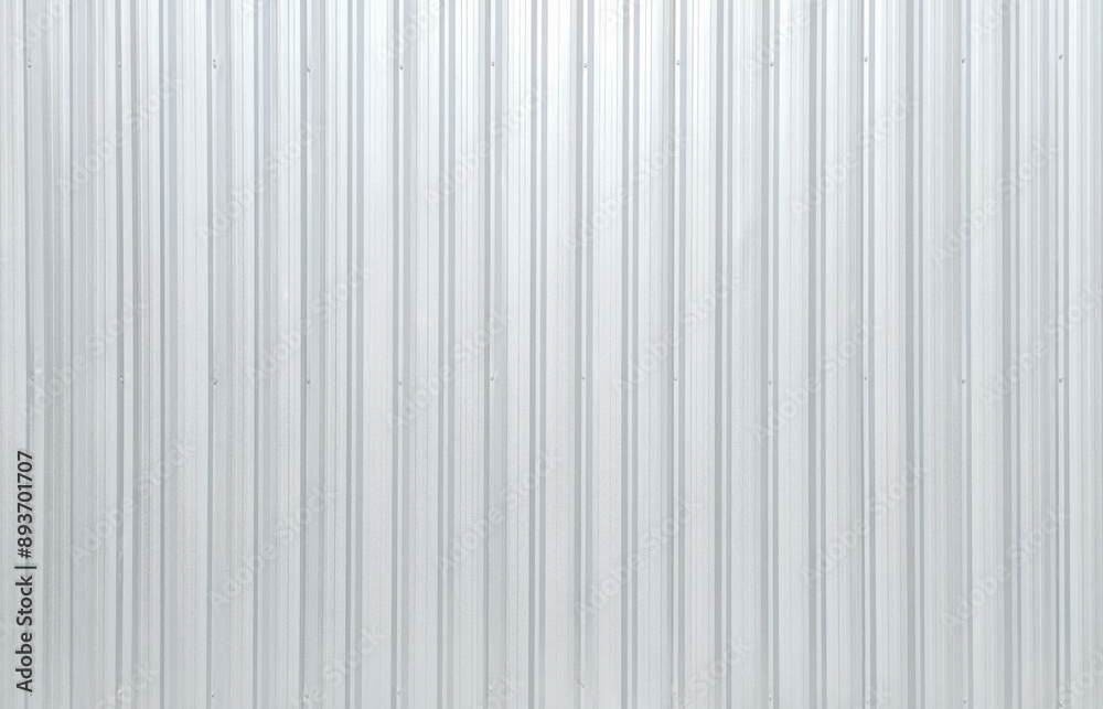 Metal aluminum silver corrugated stripe sheet wall background with texture vertical lines