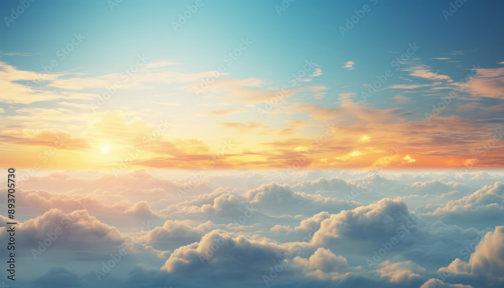The sun rising over the clouds in the sky The sun rising over the clouds in the sky