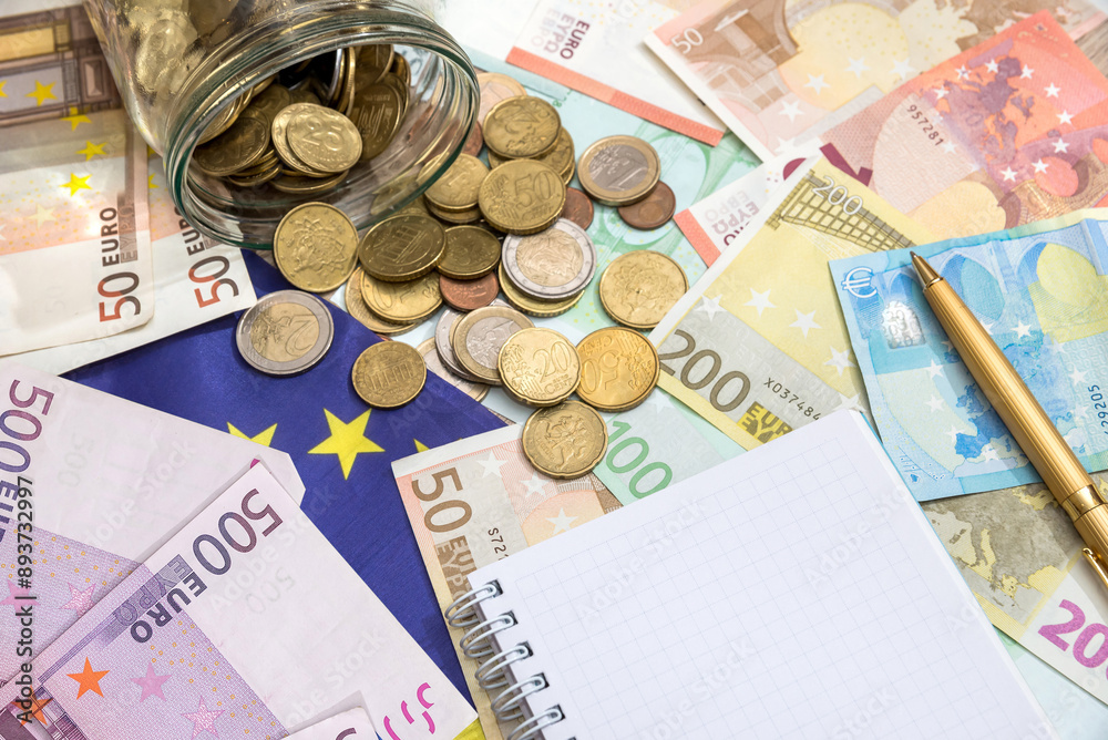 lot of different paper euro and metal coins placed on top. Financail background lot of different paper euro and metal coins placed on top. Financail background
