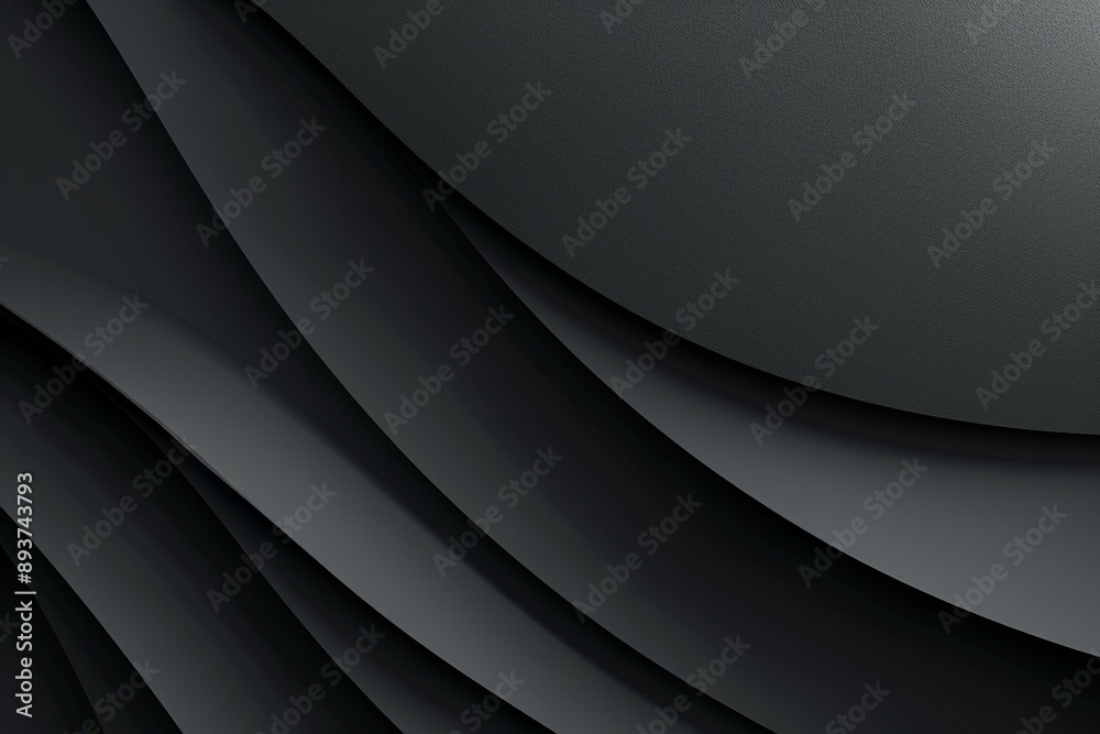 Black background with dark gray shapes blending into black in a gradient effect