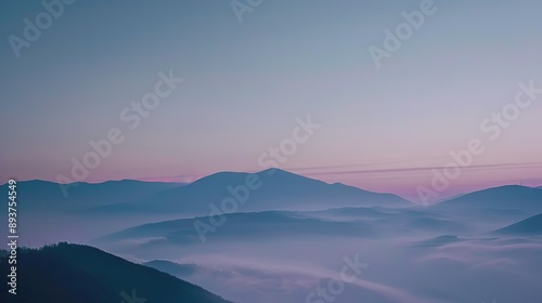 Misty Mountain Range at Sunrise With Pink Sky