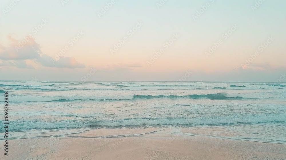 Tranquil Ocean Waves at Sunrise With Pink Clouds