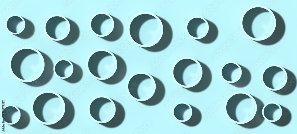 Blue circles of various sizes with shadow on a blue background, 3D rendering illustration Blue circles of various sizes with shadow on a blue background, 3D rendering illustration