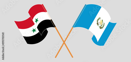 Crossed and waving flags of Syria and Republic of Guatemala
