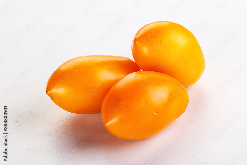 Ripe juicy yellow tomato heap Ripe juicy yellow tomato heap