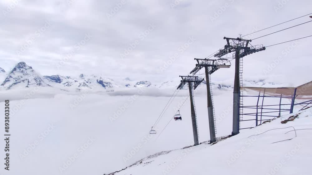 Skiresort Panorama. Endless mountain view in tyrol. Ski lift above the clouds. Skiresort Panorama. Endless mountain view in tyrol. Ski lift above the clouds.