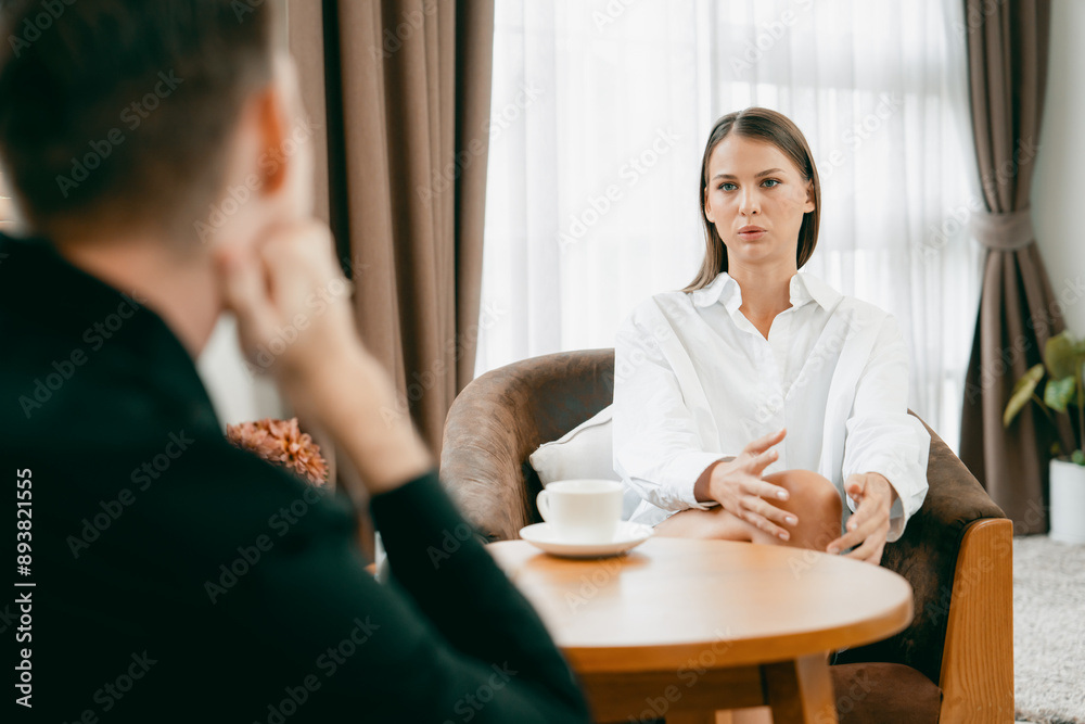 Psychological consultation gaining improvement on mental problem, happy young female patient doing therapy session while psychiatrist making diagnostic on mental illness. Unveiling Psychological consultation gaining improvement on mental problem, happy young female patient doing therapy session while psychiatrist making diagnostic on mental illness. Unveiling