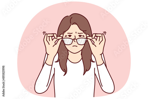 Woman with vision problems squint when touching does not help them see fine print at distance. Young girl loses vision and needs help of ophthalmologist or vitamin with beneficial substances for eyes