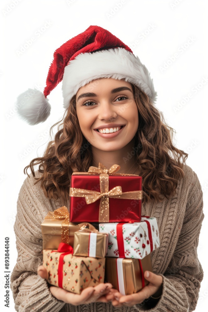During Christmas, a woman in a Santa hat brings joy through gifts, creating a festive and loving atmosphere. Her actions symbolize the holiday spirit of cheer, love, and celebration During Christmas, a woman in a Santa hat brings joy through gifts, creating a festive and loving atmosphere. Her actions symbolize the holiday spirit of cheer, love, and celebration