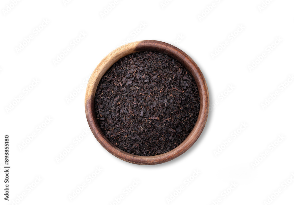 Black tea dried leaves on a bowl isolated over white background Black tea dried leaves on a bowl isolated over white background