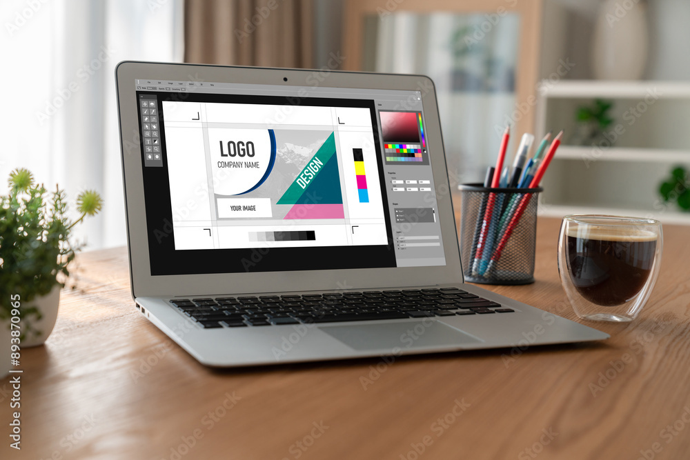 Graphic designer software for modern design of web page and commercial ads showing on the computer screen Graphic designer software for modern design of web page and commercial ads showing on the computer screen