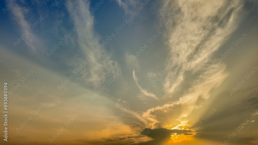 Fototapeta premium Dramatic sunset sky with vibrant clouds representing the concept of hope and new beginnings