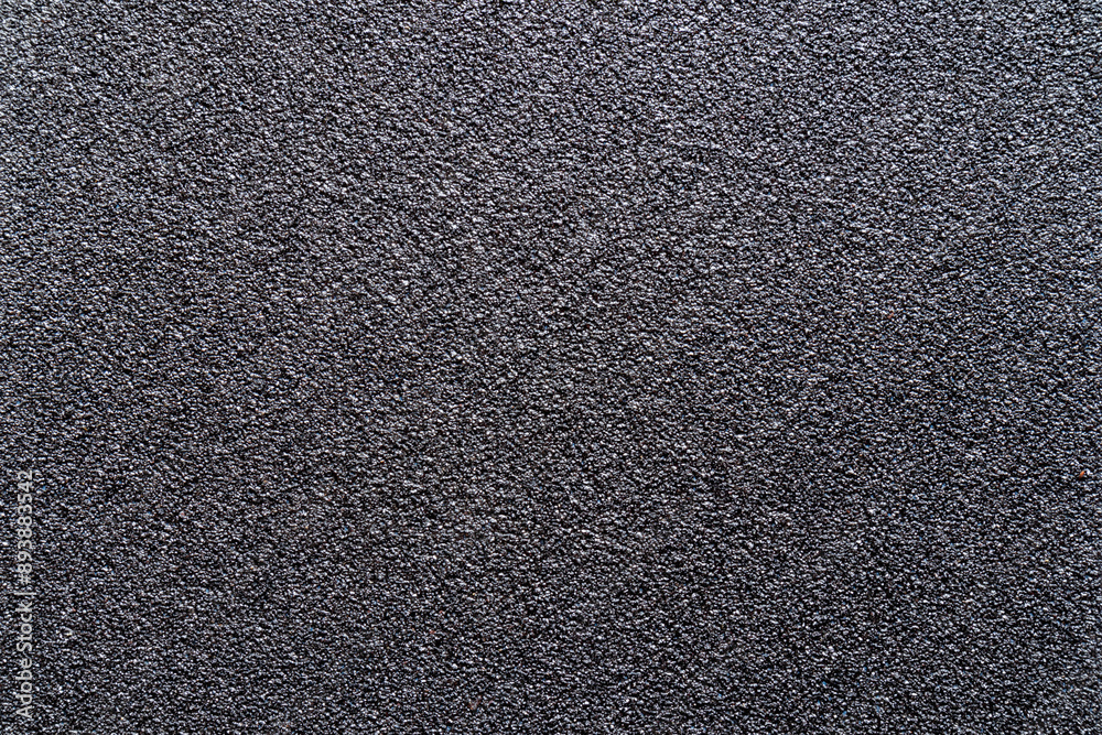 Sandpaper texture background gives a beautiful pattern of black sand grains on sandpaper, suitable as a background for inserting text. Copy Space for designers to use on sandpaper. Sandpaper texture background gives a beautiful pattern of black sand grains on sandpaper, suitable as a background for inserting text. Copy Space for designers to use on sandpaper.