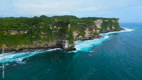 Uluwatu Temple is a Balinese Hindu sea temple located in Uluwatu. The temple is regarded as one of the sad kahyangan and is dedicated to Sang Hyang Widhi Wasa in his manifestation as Rudra. photo