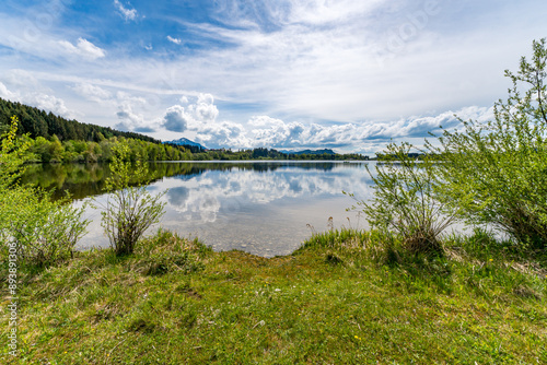 Leisurely hike in early summer at Rottachsee in the Allgau photo