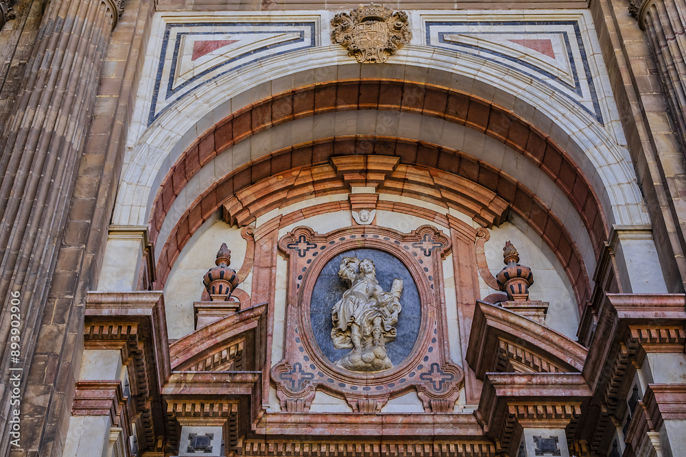 Fototapeta premium Architectural details of entrance to Malaga Cathedra. Cathedral is Roman Catholic Church (Santa Iglesia Catedral Basilica de la Encarnacion), was constructed in 1528 -1782. Malaga, Andalusia, Spain.