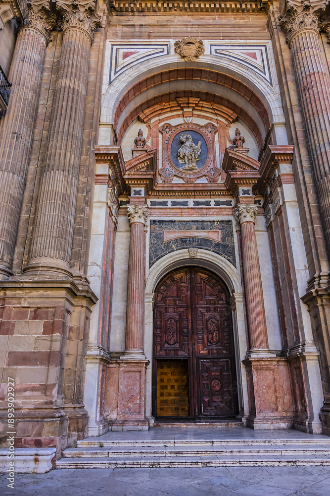 Fototapeta premium Architectural details of entrance to Malaga Cathedra. Cathedral is Roman Catholic Church (Santa Iglesia Catedral Basilica de la Encarnacion), was constructed in 1528 -1782. Malaga, Andalusia, Spain.