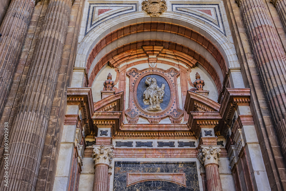 Fototapeta premium Architectural details of entrance to Malaga Cathedra. Cathedral is Roman Catholic Church (Santa Iglesia Catedral Basilica de la Encarnacion), was constructed in 1528 -1782. Malaga, Andalusia, Spain.