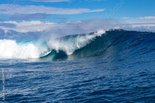 A monster wave at Teahupoo (The end of the road)  Tahiti, French Polynesia. The village of Teahupoo is known as “The end of the road” because the road from Papeete ends there.