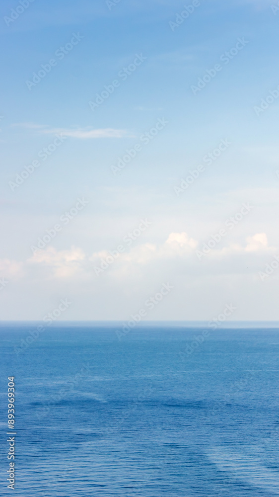 Blue ocean panorama with blue atmosphere, the vast open sea with clear sky, ripple wave and calm sea Blue ocean panorama with blue atmosphere, the vast open sea with clear sky, ripple wave and calm sea