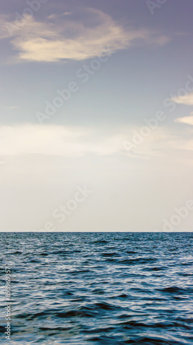 Blue ocean panorama with blue atmosphere, the vast open sea with clear sky, ripple wave and calm sea